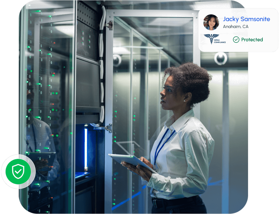 A woman in a server room holding a tablet and inspecting equipment, with an overlay showing a user profile labeled “Jacky Samsonite – Protected” and a HIPAA compliance badge.